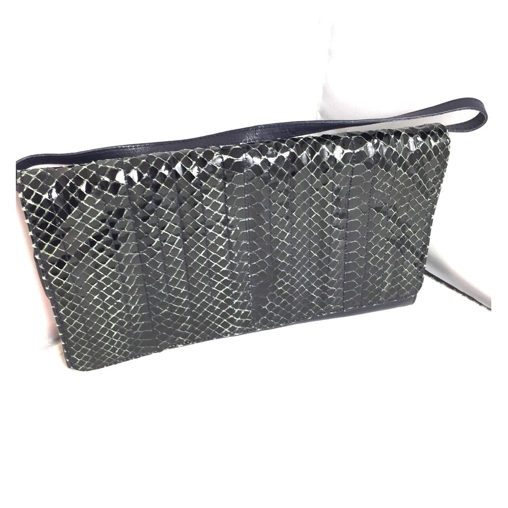 Leather snakeskin clutch and strap bag